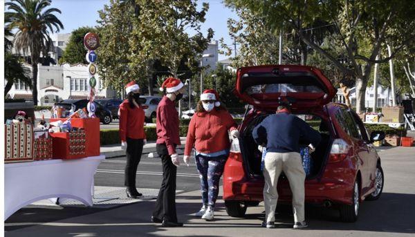 Delivery of unwrapped toys for the police to distribute to local children.