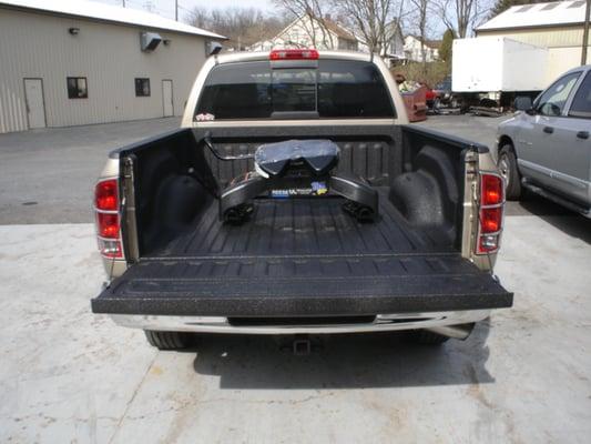 Installed fifth wheel hitch, then sprayed with Ultimate Liner