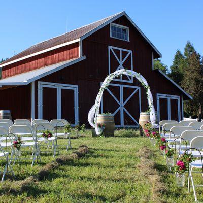 Field Wedding with Barn background feature.