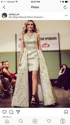 Yulia, our beautiful model wearing a Gold Mac Duggal high low gown.