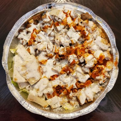 Large chicken & lamb platter with extra white sauce and some hot sauce. Definitely a lot of food for less than $9.