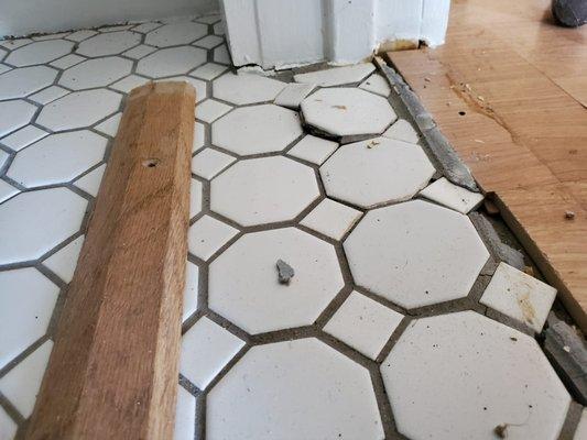 tile floor damaged