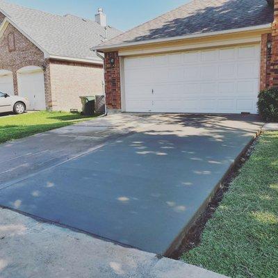 New concrete driveway. Call for references. Or Google the reviews! Not the most expensive guy in town.