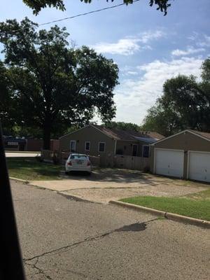 View from the side street. Room for a few cars to park.