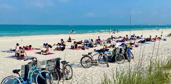 Ride your bike to beach yoga on Pass-a-Grille between 15th and 16th Ave across from Hurley Park and the Pass-a-Grille Church.