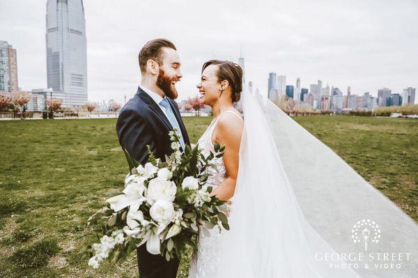 My bouquet: I wanted a blend of classics white roses and peonies with lilies and tropical greenery. They hit the nail on the head!