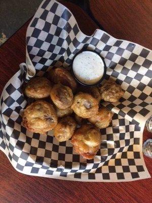 Battered and deep fried mushrooms in the fancied-up fast food restaurant plus bar.