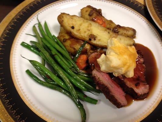 Beef tenderloin served with french cut green beans and fingerling potatoes