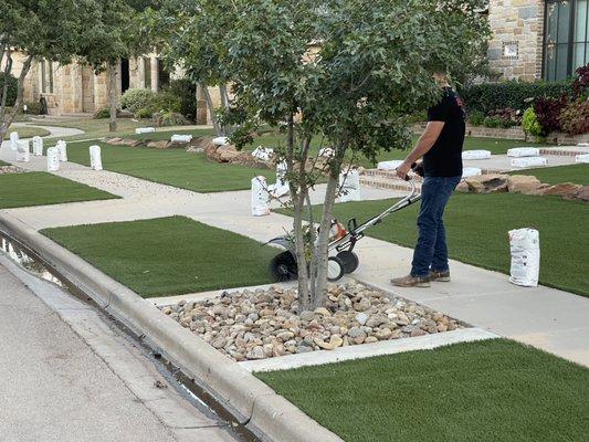 Cleaning turf with our brush.