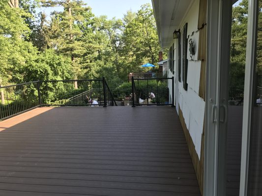 Composite deck with an aluminum cable rail.