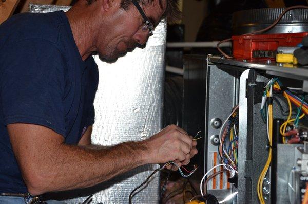 Wiring the new furnace.