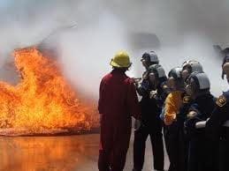 Cadets learn to fight fires aboard ship.