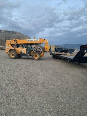 Oil field company delivery unloading in Grand Junction Colorado.