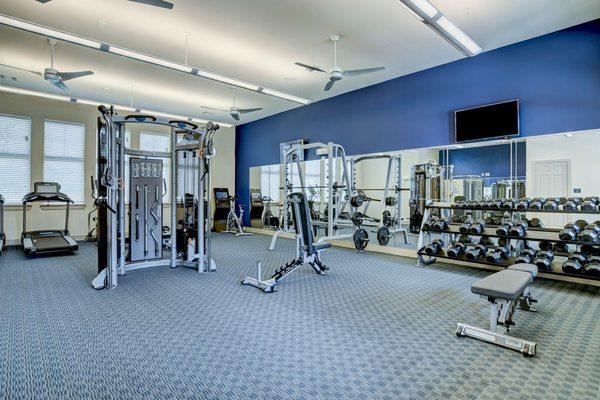 Fitness centers with latest equipment including free weights and yoga spaces are standard in San Antonio apartments.