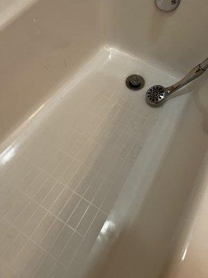 Uncleaned bathtub. They wiped it with a rag after I told them. Not a single bath cleaning product used!