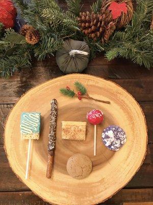 rice krispy treat, dark chocolate dipped pretzel stick, snickerdoodle bars, ginger snap cookie, lemon cake pop, ube cookie!!! YUM