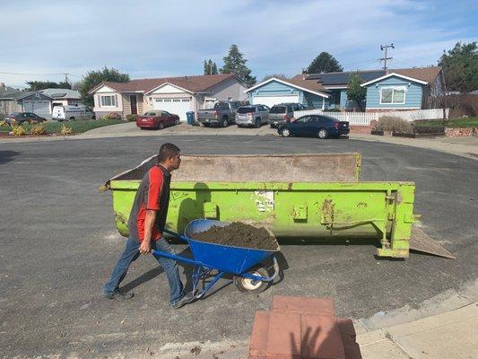 My workers will have to go all the way from my house to the neighbor's to get rid of the dirt.