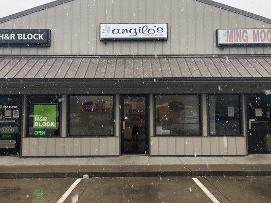 Angilo's Pizza between Ming Moon and H&R Block