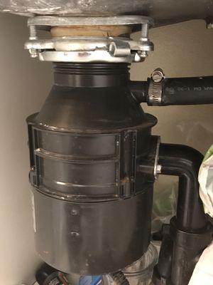 Installed garbage disposal and reattached plumbing