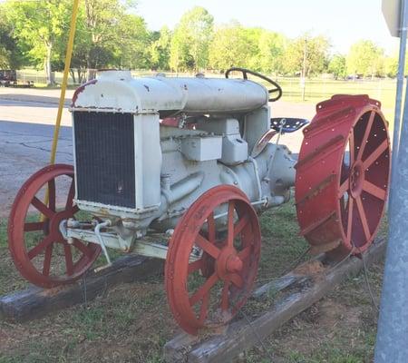 Look for this tractor out front at the corner of our store, you will know you're in the right place.