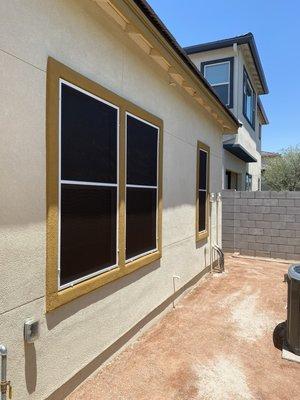 Window sunscreens. 90% black fabric with white frame.