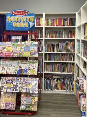 Large selection of books and activity pads.