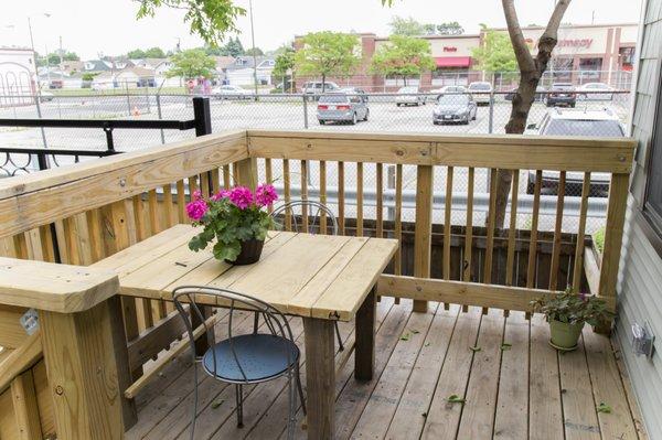 Used the extra lumber on site to make a custom table for this city-size porch!