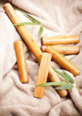 Warm bamboo sticks for a relaxing or deep tissue massage