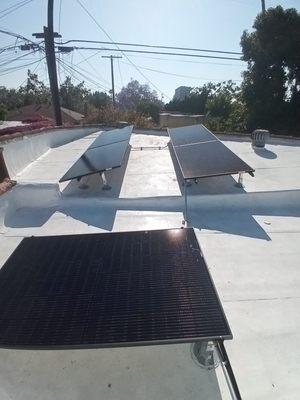 Flat roof system with new Roof