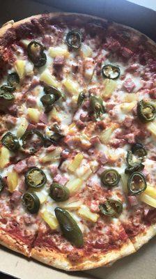 Hawaiian pizza with added jalapeños