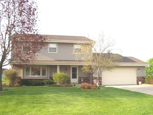 Updated Insulated siding system complete with maintenance free soffit/fascia trim.