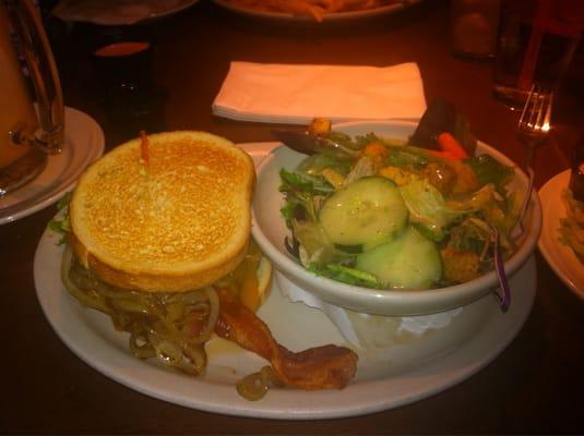 Avacado bacon burger on sourdough with grilled onions