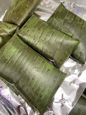 Tamales cooked in banana leaves .pork or chicken