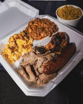 TriTip plate. 1/2 lbs TriTip, Hot Link, Red Chicken Drumstick, Jalapeño Crab Mac&Cheese, TriTip Chili Beans,  Rice Pilaf.