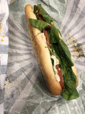 Chicken salad classic with roasted peppers, Swiss, spinach, tomatoes, and onions.