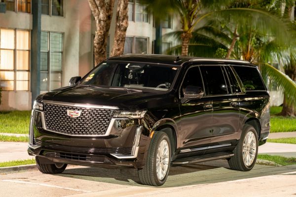 Experience our Luxurious Escalade New Models SUV with our professional drivers.