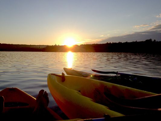 Kayaks at sunset