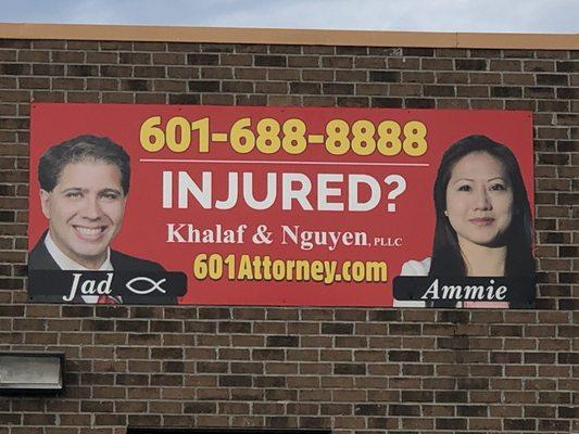 Khalaf & Nguyen Law Firm billboard at Khalaf Plaza in Hazlehurst, Mississippi