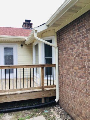 Seamless gutters and power washed deck