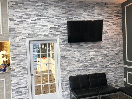 Our entry wall decorated with wonderful Alaskan Grey Stone.