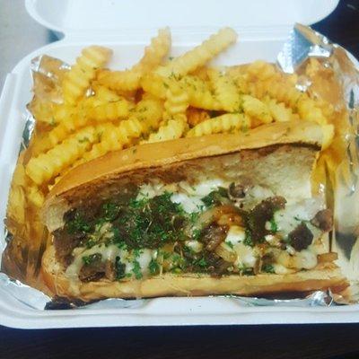 Cheese steak and signature honey garlic fries