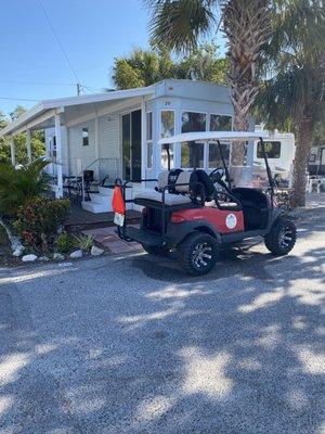 Our rental cart in front of cabin rental at Buttonwood