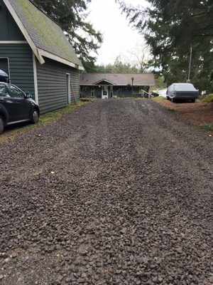 Gravel is already settling in. No more sloshing through puddles to get in the car!