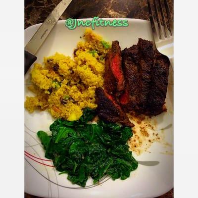 Grass Fed Bison pan seared in Grass fed Butter with Apple almond quinoa salad and sautéed spinach.