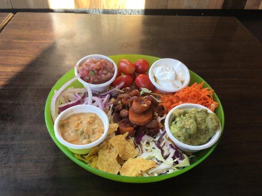 Vegan Taco Salad (Shown w/ Sour Cream); Signature Salad