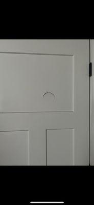 Hole in the door. Not fixed before we moved in. All the walls and paint were rough. This took 4 months to fix