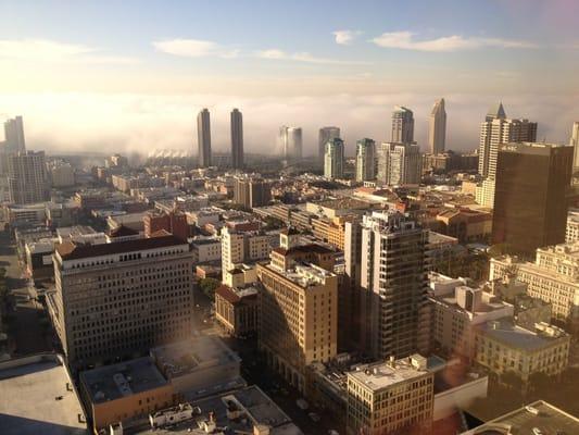 View from University Club as a fog bank envelopes Coronado and the Convention Center.