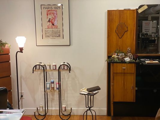 Small accessories - lamp, display shelving, small tile & iron table, Parish 1925 artwork  All pieces  accessorize a  hair salon