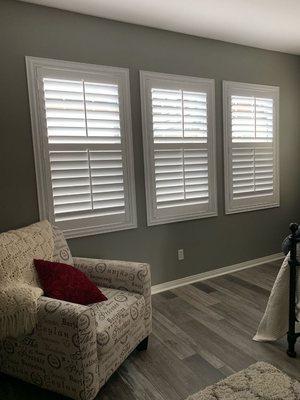 Plantation shutters with mid-rail