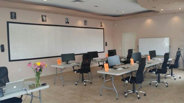 New center has the latest Macs and 29" SuperWide Flatscreens!